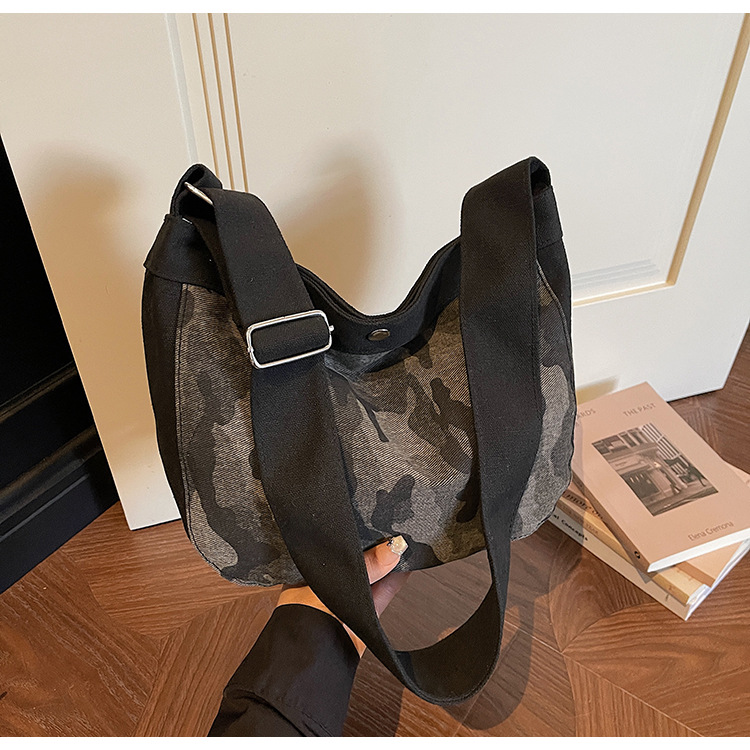 Casual bolso de camuflaje de gran capacidad para mujeres 2026 nuevo lienzo retrógrado simple mochila de hombro para viajar bolsa