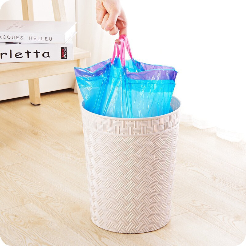 Bolsa de basura de cuerda de extracción doméstica grosada y grande 50 * 60 puntos de cocina cerrada automáticamente bolsa de plástico portátil al por mayor