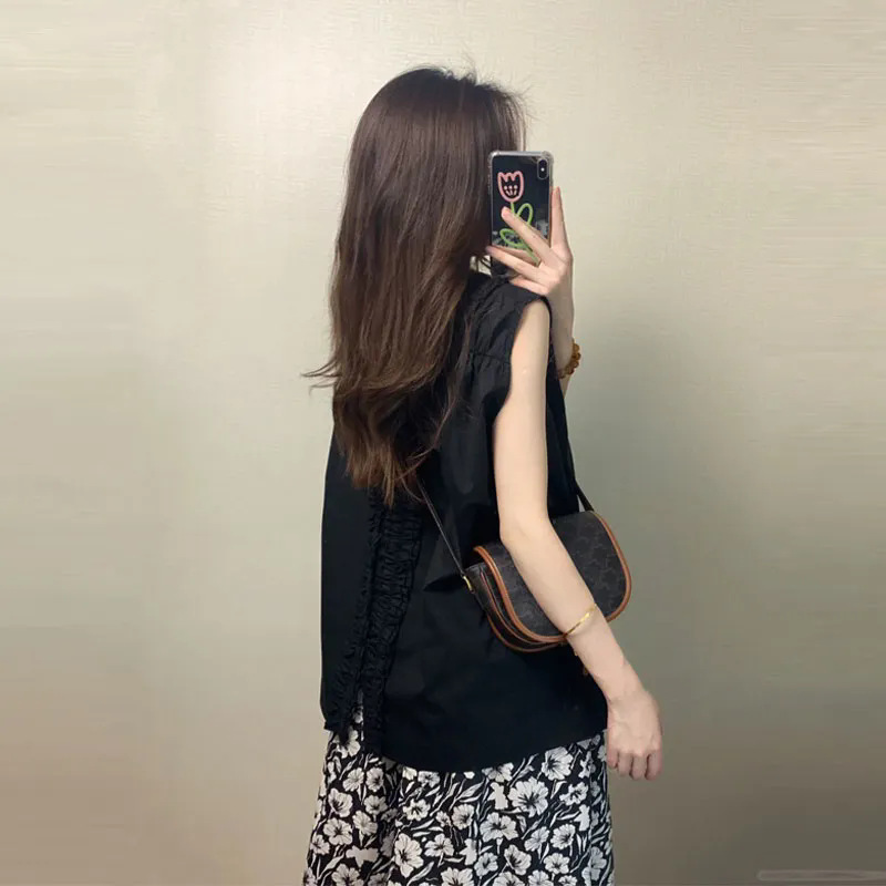 香港スタイルの女性用痩身ツーピーススーツ 2025 夏のファッショナブルな気質と花柄のスカートが付いた年齢を軽減するノースリーブトップ|undefined