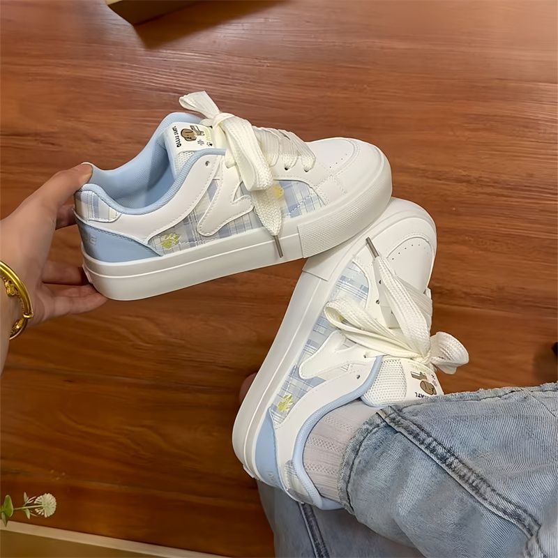 Arco de nicho coreano lindo zapatos blancos para mujeres 2025 primavera y otoño nuevo estilo de moda pareja zapatos de pan deportivo