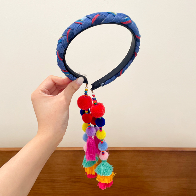 Blue headband with pigtail