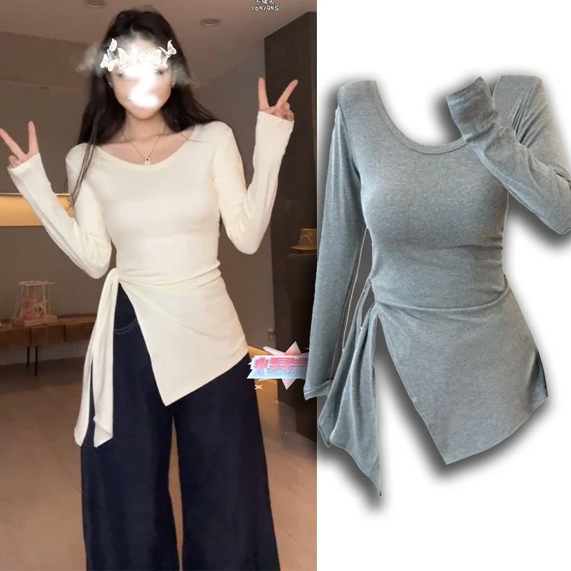 太ったmmの大きいサイズの婦人服の中で長いタイプの修身はやせている長袖のtシャツの不規則な開叉のひもの底のシャツの上着を現します。|undefined