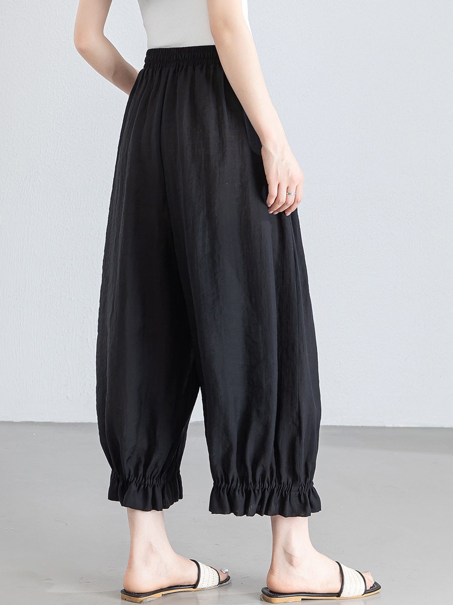 Quần culottes nữ ống rộng cạp chun co giãn, chất liệu Lyocell thoáng mát, dáng hoa tulip che khuyết điểm — màu đen