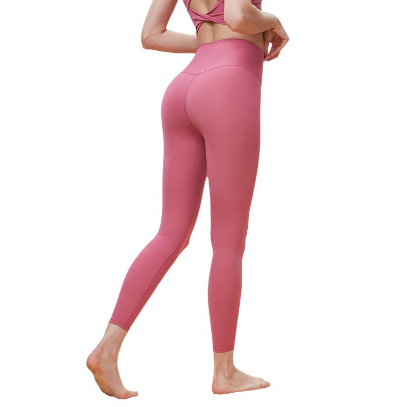 Primavera y verano nuevos pantalones de yoga deportivos desnudos V cintura apretada pantalonada de mel桃ar para correr pantalones de fitness deportivos para mujeres