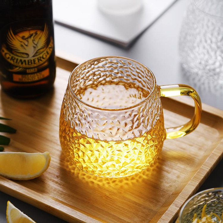 Venta al por mayor borosilicato martillado taza de té de vidrio espesado jugo leche taza de té con mango piña taza de té