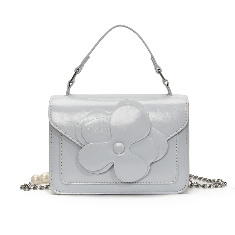 Versión coreana de moda moda moda estilo occidental cadena portátil pequeño bolso cuadrado femenino 2025 nuevo bolso de mensajero de hombro simple casual de todo fósforo