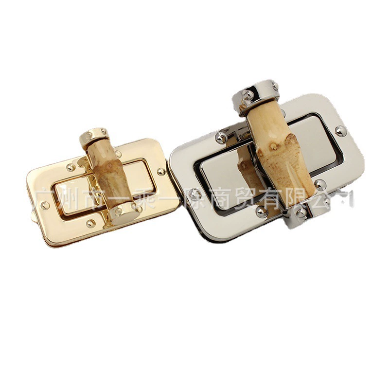 Factory direct sale natural bamboo knot clasp golden twist lock handmade bamboo double G bag bamboo turning lock, package fixed lock
