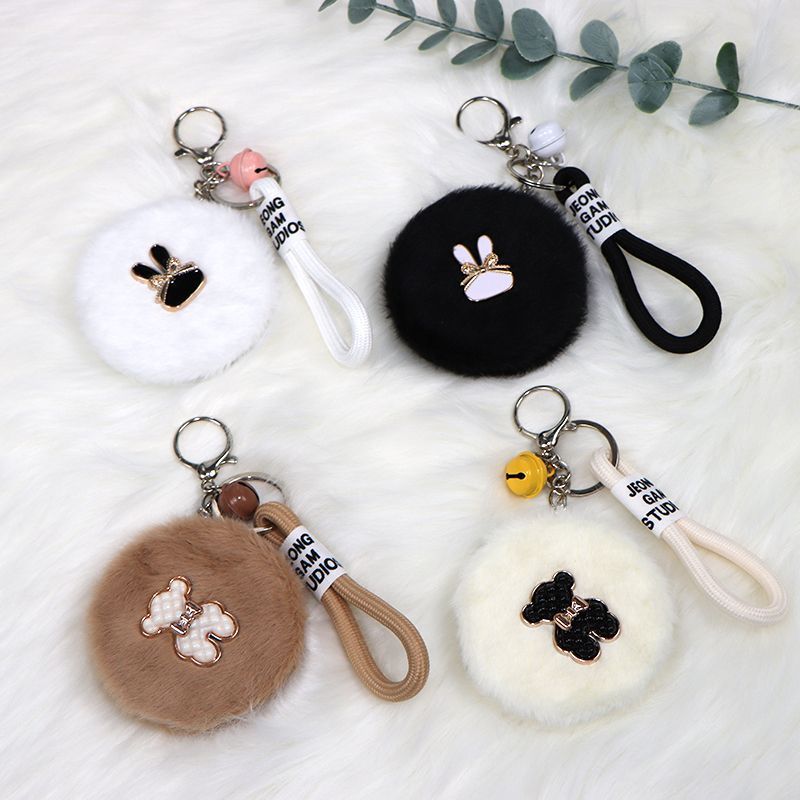 Luz de lujo pequeño viento de peluche colgante espejo bolso colgante espejo de maquillaje llavero plegable con espejo de doble cara a prueba de pérdida