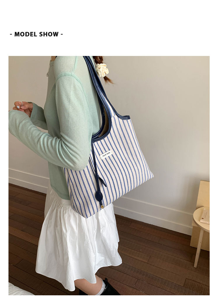2025 Casual Commuter Tote bag, women's niche striped simple and fashionable hand-held shoulder bag, large-capacity underarm bag undefined