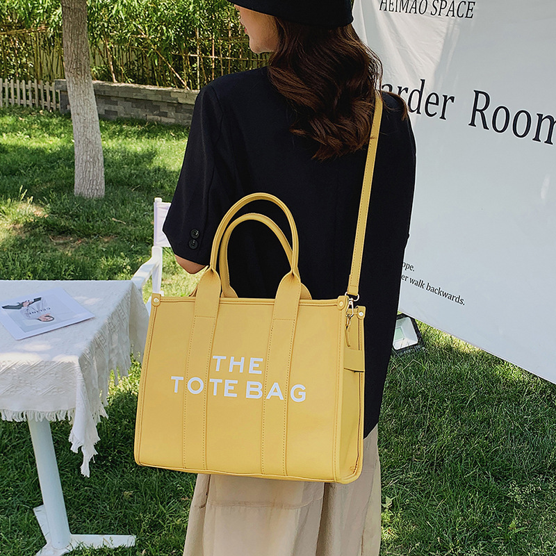 Transfronterizo 2022 nuevas tendencias de bolsos tote de tamaño grande en verano, una variedad de bolsos de mujer simples, personalidad simple y moda