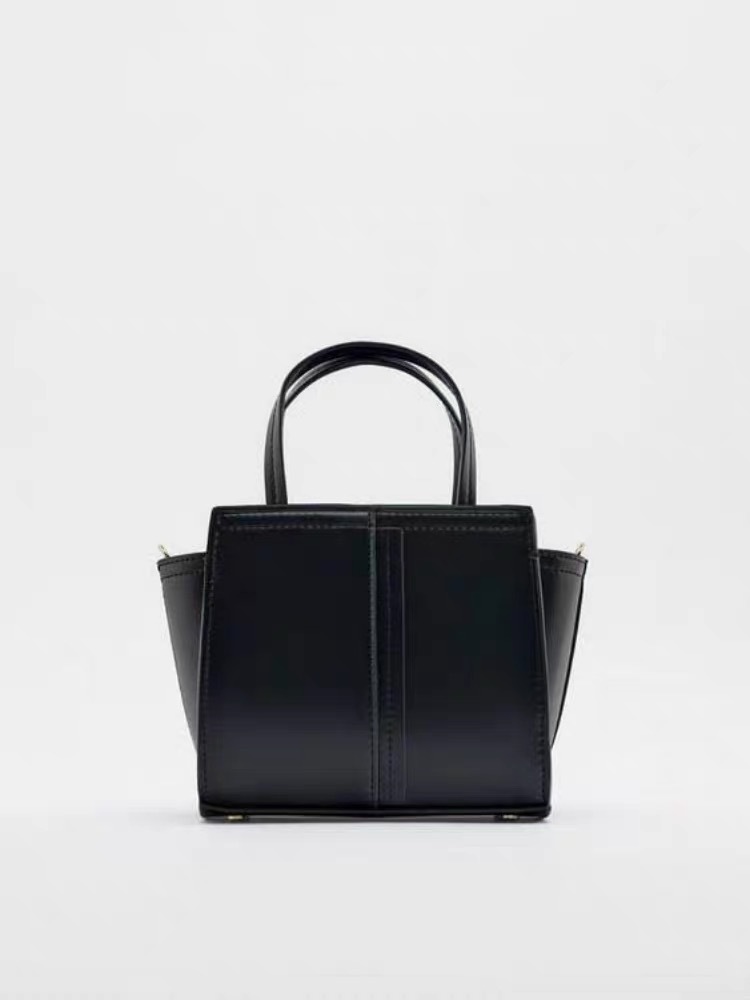 Moda transfronteriza nueva bolso de mujer bolso de mano red coreana esmalte brillante alas bolso de hombro