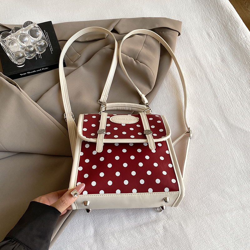 Mochila de estudiantes de ondas coreanas para mujeres 2024 nueva moda alta sensación de nicho de moda mochila de viaje