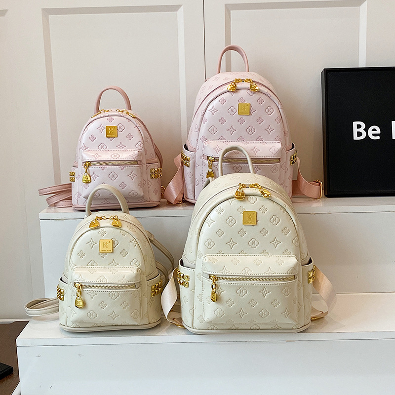 2025 New Backpack Female College Student Niche Design High-End Leather Commuter Travel Lightweight Small Backpack
