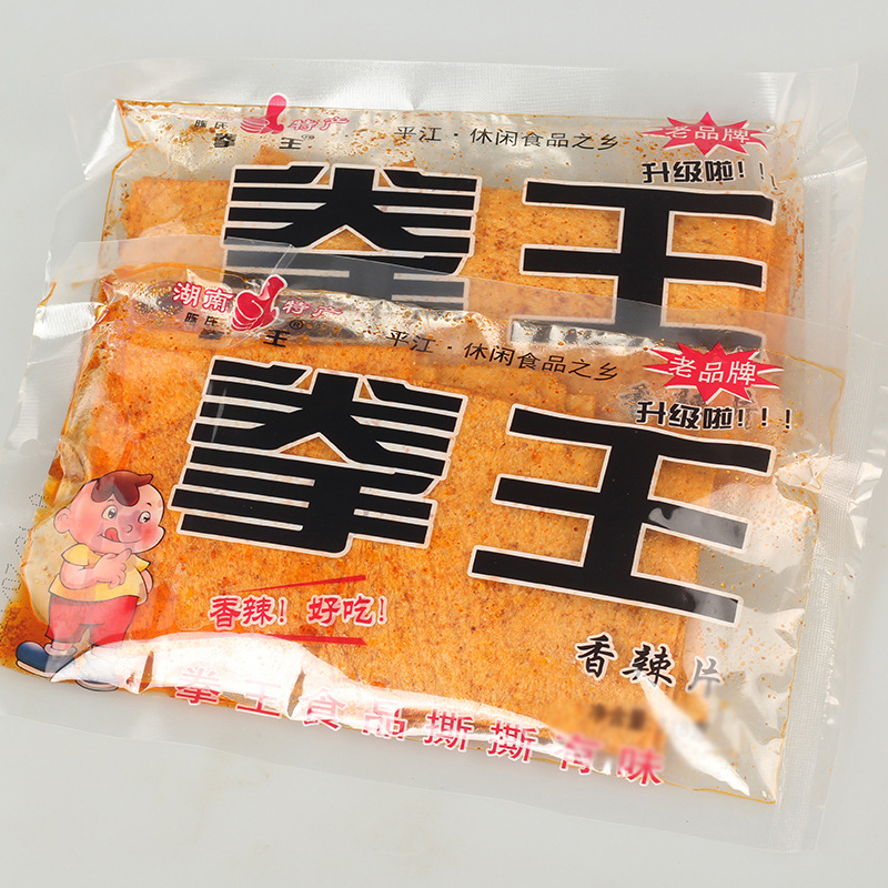 Hunan specialty boxing king 108g shredded spicy slices spicy slices bean skin 80's childhood spicy snacks spicy strips wholesale