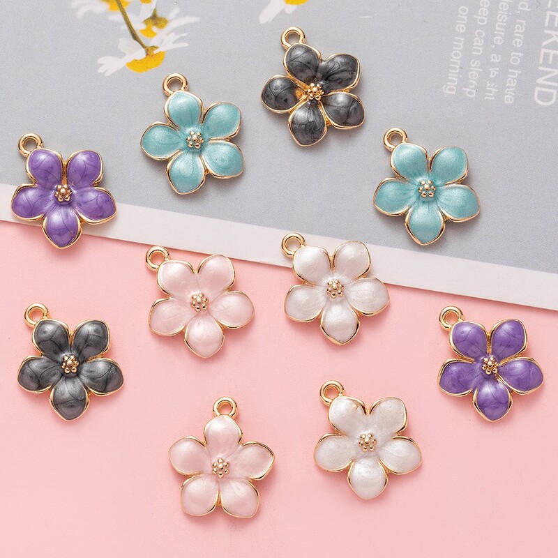 Yiwu diy jewelry accessories alloy oil cherry blossom kangya wind pendant earrings hair accessories bracelet material wholesale