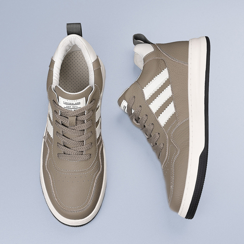 Invierno de cuero de vaca nuevo alto algodón zapatos de hombre zapatos deportivos casuales de cuero más terciopelo calentamiento zapatos de hombre