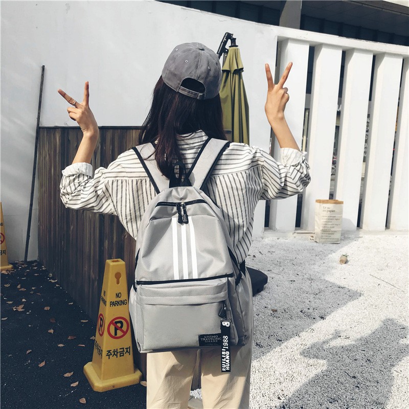 Simple and Stylish Backpack for Men and Women, Large Capacity, Lightweight Travel School Bag, Waterproof Nylon Couple Backpack, New Model