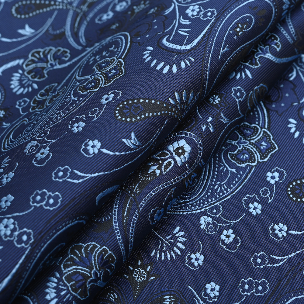 湛蓝色男士领带面料色织提花涤纶丝佩斯利腰果花领带面料批发