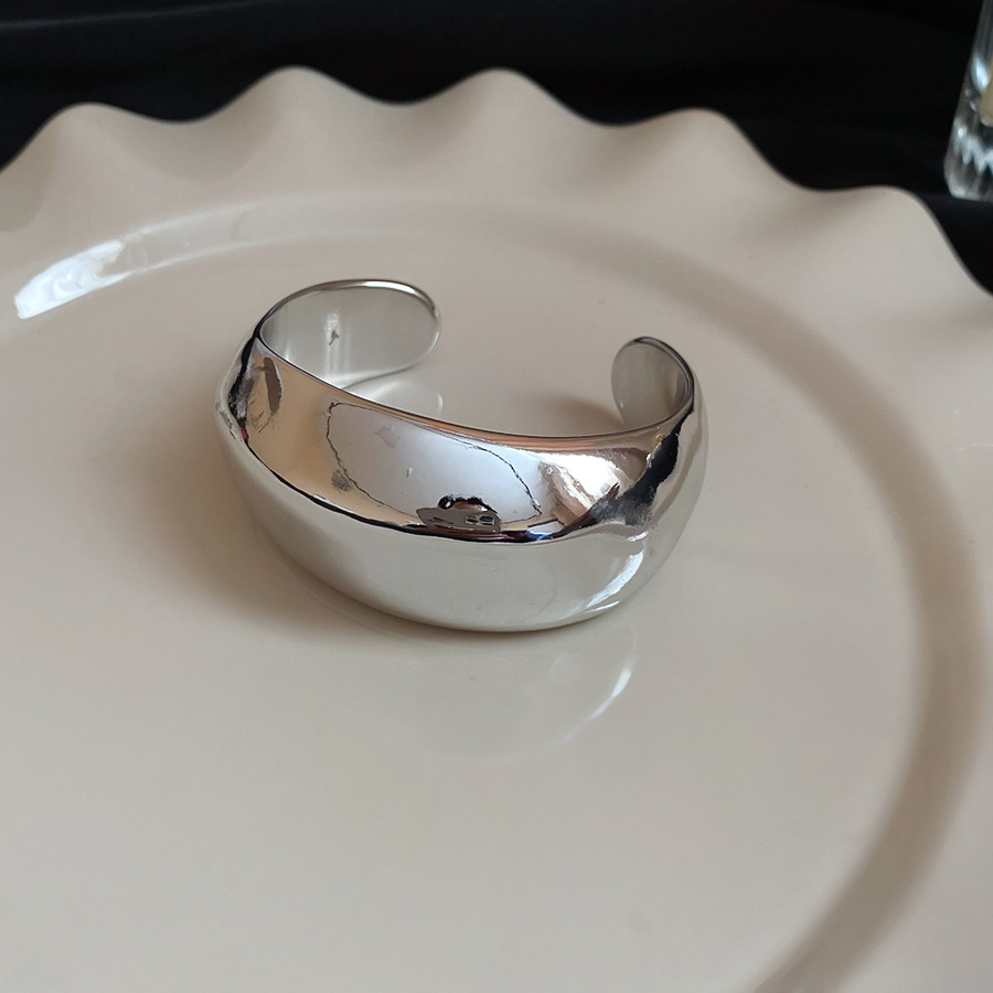 Pulsera abierta con torsión brillante geométrica irregular, pulsera de nicho de personalidad de estilo europeo y americano, joyería de temperamento exagerado al por mayor