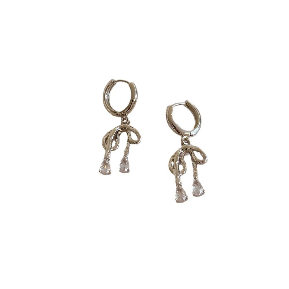 Cute elegant earrings with bow with zircon