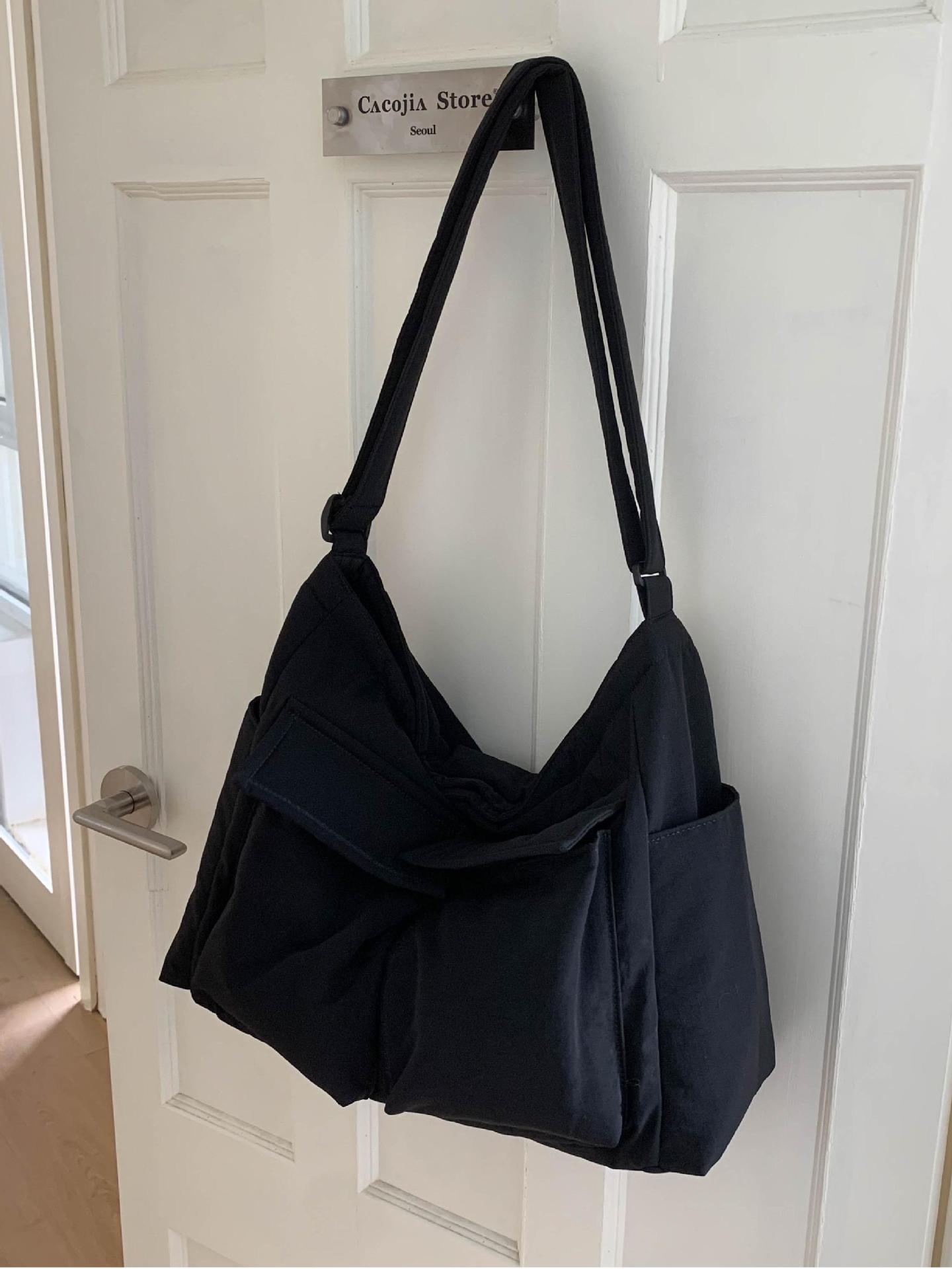 Bolsa de lona de explosión de comercio exterior para mujeres 2025 nuevo viaje multibolsillo bolso de gran capacidad para trabajar mochila de hombro