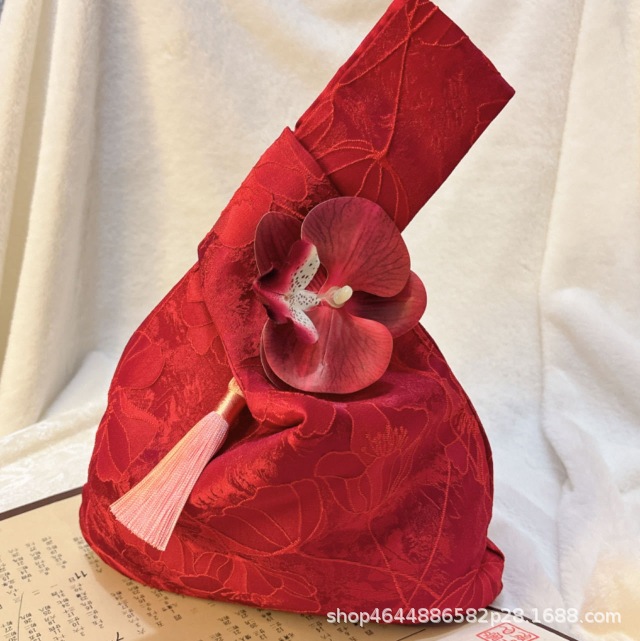 Red wrist bag with flowers