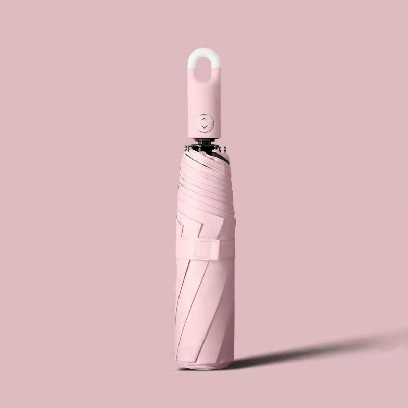 Llavero creativo paraguas pegamento negro paraguas plegable tríptico automático color sólido protección UV paraguas de sol paraguas de bloqueo