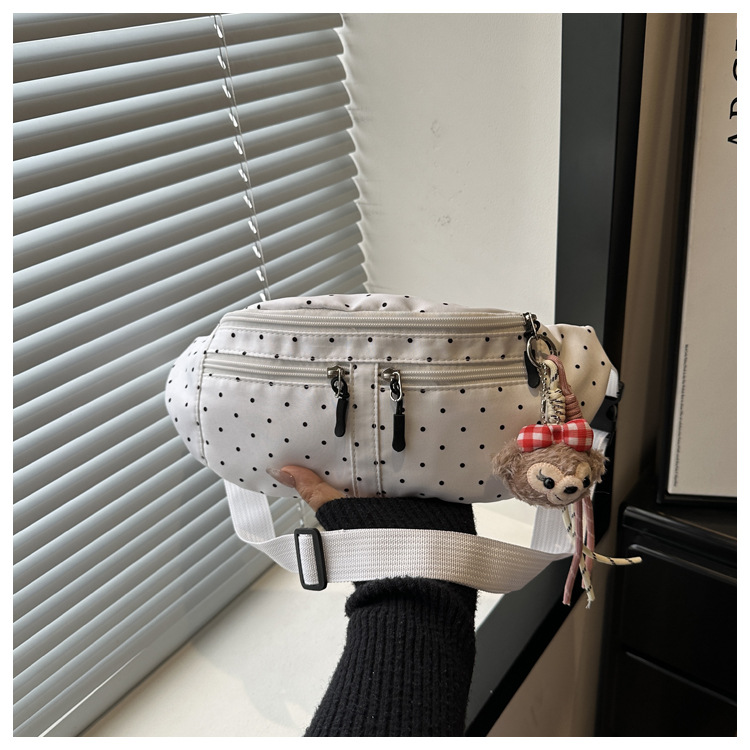 Este año, la moda fresca y dulce bolso de pecho para mujeres 2026 verano nuevo punto de onda bolso de hombro bolso de cintura de estilo extranjero