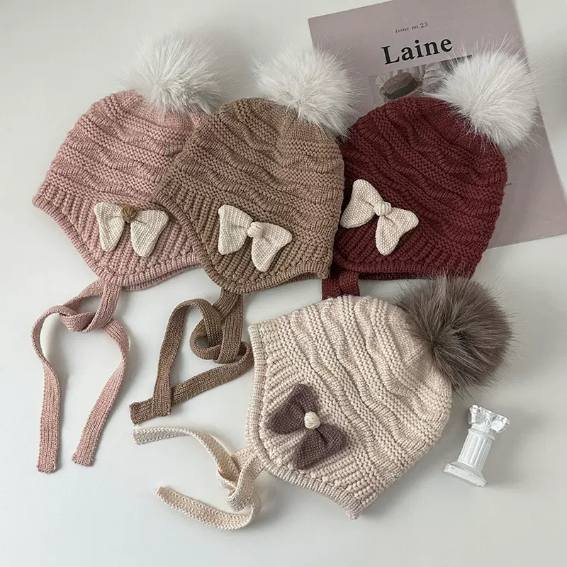 洋气蝴蝶结编织护耳帽毛球系带保暖毛线帽秋冬季新款儿童针织帽