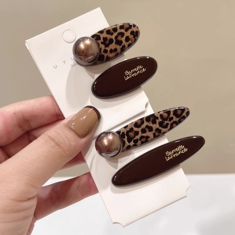 カレー色のヒョウ柄のヘアピンの女性のサイドクリップのサイドの前髪クリップの気質の優雅なアヒルの口の女性の一字のクリップのヘアアクセサリー