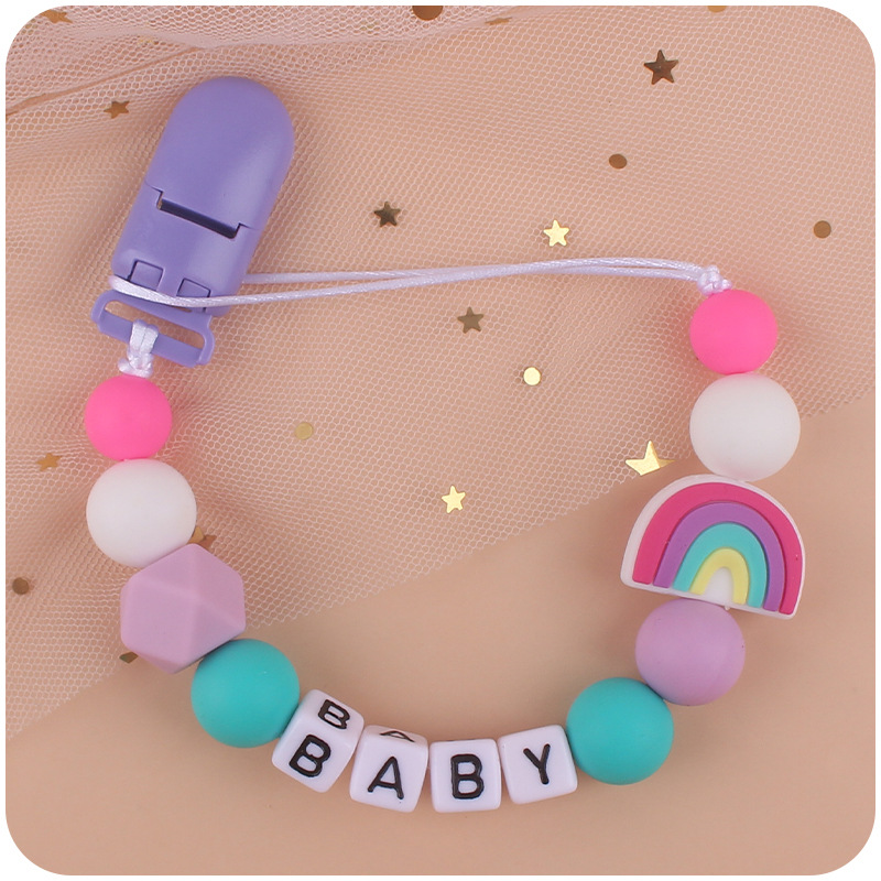 Nuevos suministros para bebés chupete Cadena de dibujos animados lindo arco iris de silicona pequeña cadena anti-caída mordedor