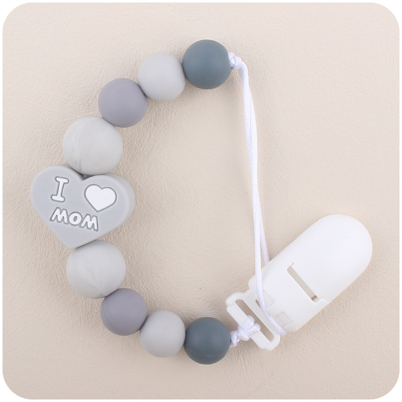 Bebé de dibujos animados amor dos lados mamá papá silicona mordedor calmante bebé chupete cadena a prueba de mordedura