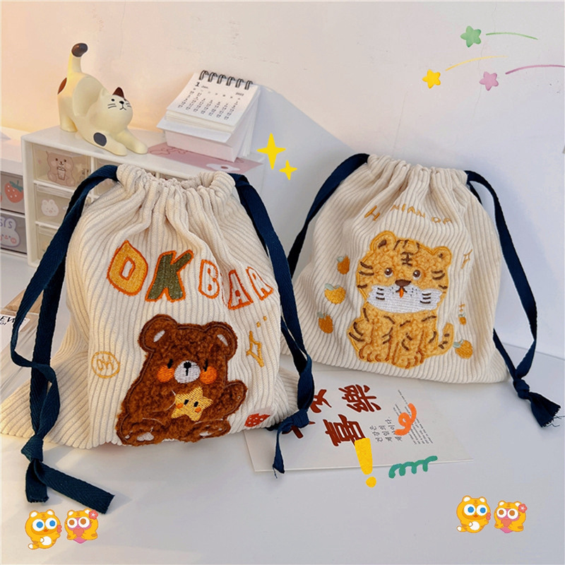 112306 Embroidered little tiger drawstring bag, cute travel gift bag, student miscellaneous storage and makeup bag Application Scenario