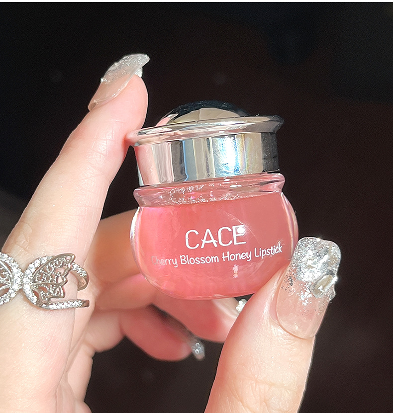 CACE Cherry Blossom Honey Lipstick locks in moisture, moisturizes, repairs cracks, and makes lips tender and plump. Customized logo wholesale undefined
