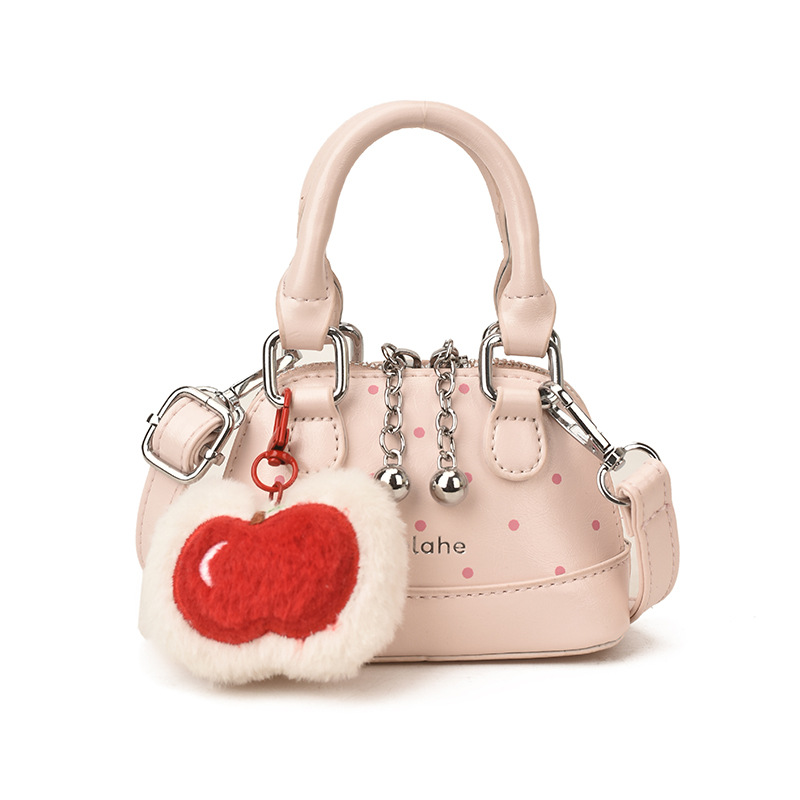 Bolsas coreanas para niños y niñas, bolsas de conchas, bolsas de mano de manzana, bolsas para niños, bolsas de comercio exterior transfronterizas 2026