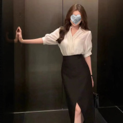 フランスの白い半袖のシャツの女性の夏の新型の気質は高級感があります。