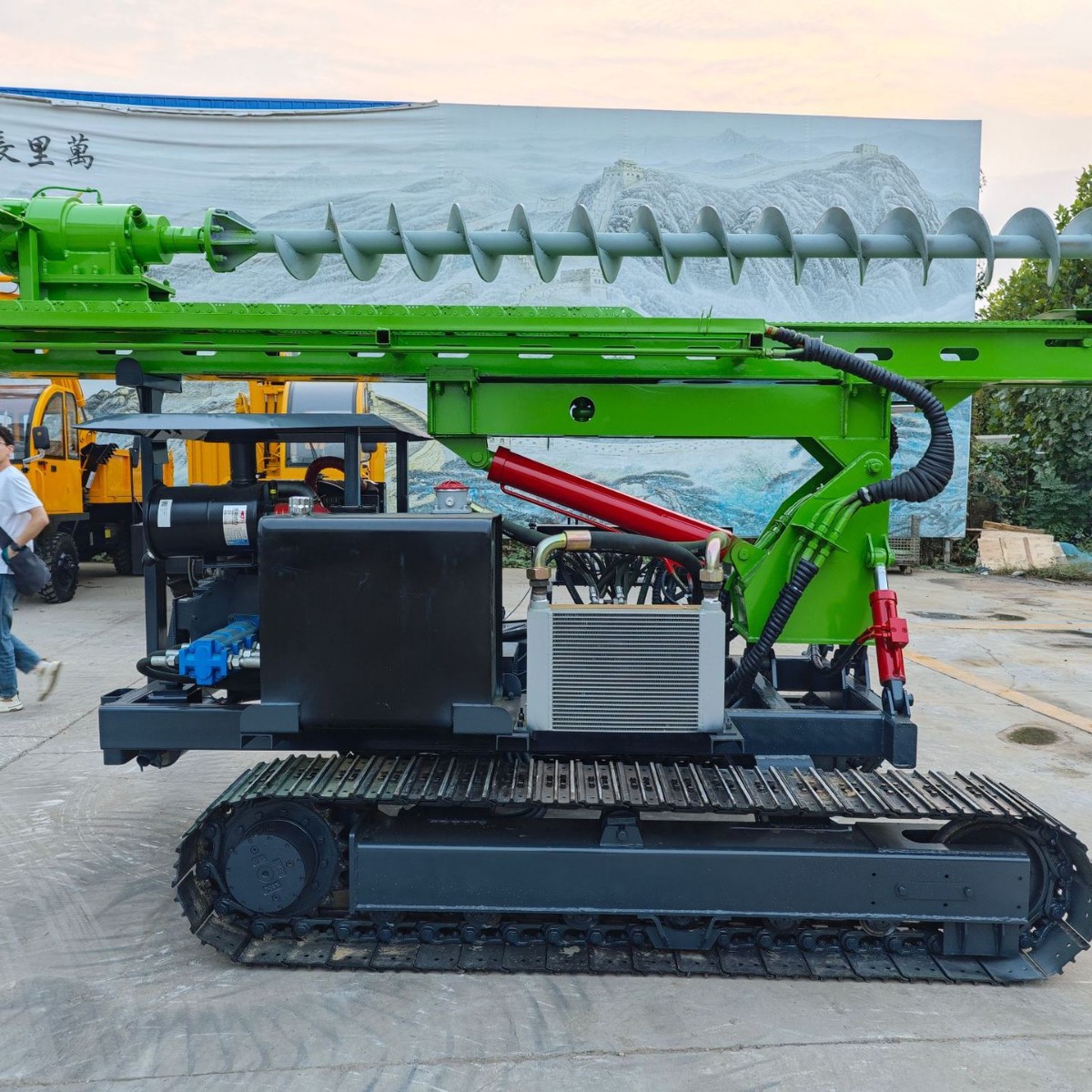 Steel track solar photovoltaic power generation pile driver