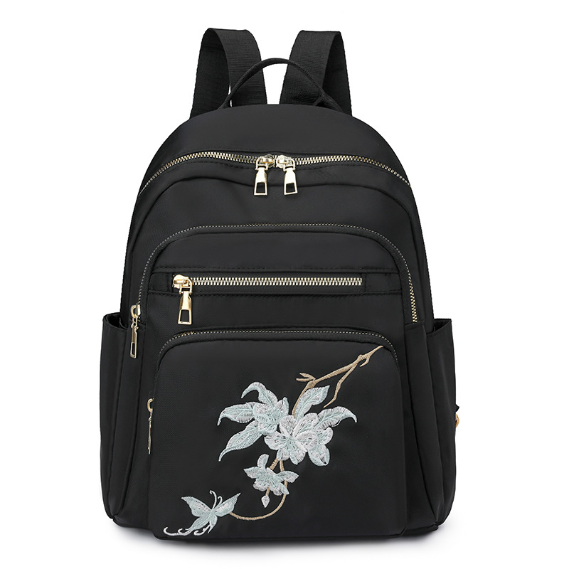 Mochila bordada para mujer 2024 nuevo estilo salvaje para mujer mochila de viaje ligero de viaje de gran capacidad de moda