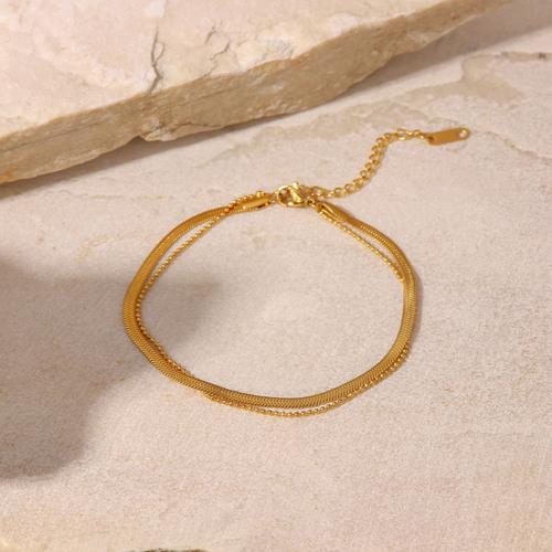 European and American French women's new titanium steel anklet 18K gold polished blade chain snake chain millet bead chain double layer anklet