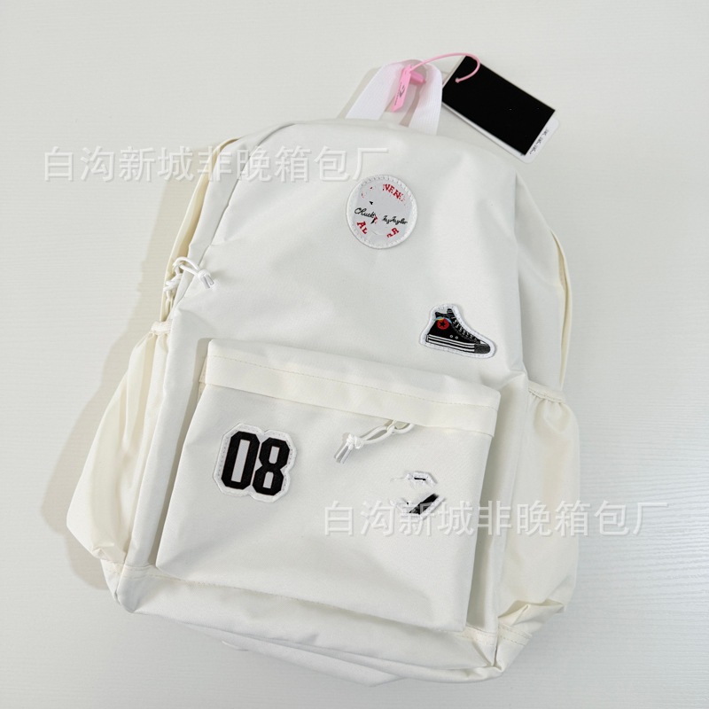 White badge