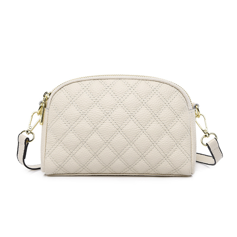 2023 Verano nueva moda crossbody de piel de vaca del todo fósforo Bolso pequeño Bolso transfronterizo del teléfono móvil del cuero genuino bolso de hombro del rombo de las mujeres