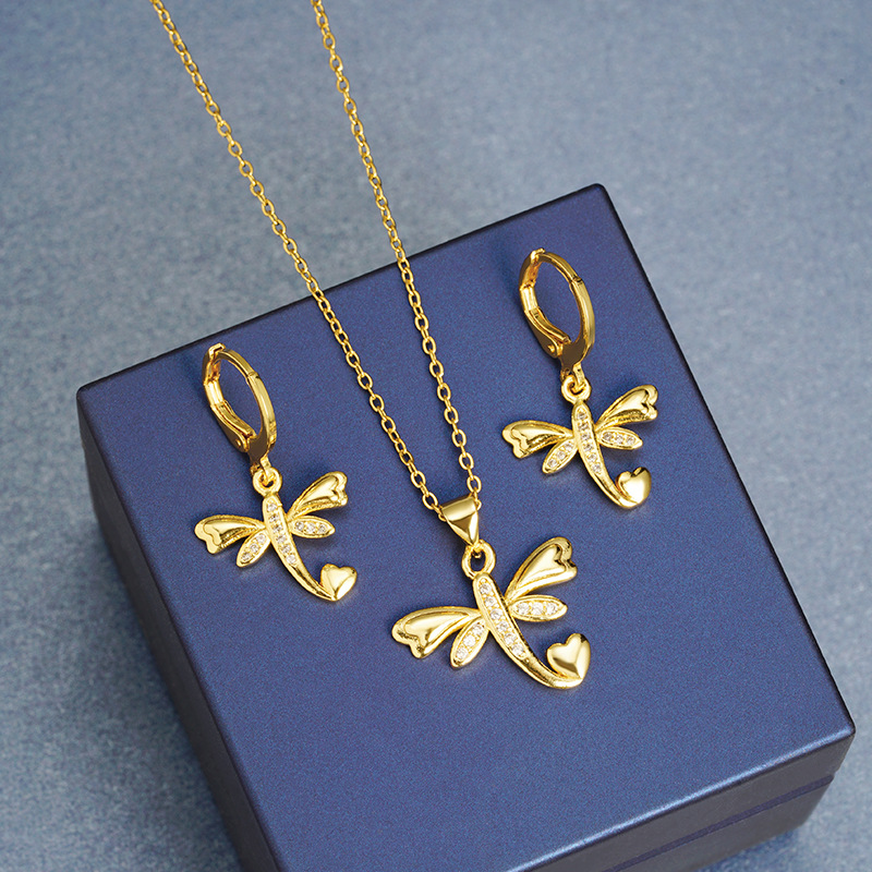 Viento europeo y americano collar de oro de arena de lujo ligero de estilo de lujo conjunto de pendientes de arroz de arroz de joyas temperamento transfronterizo mujeres al por mayor