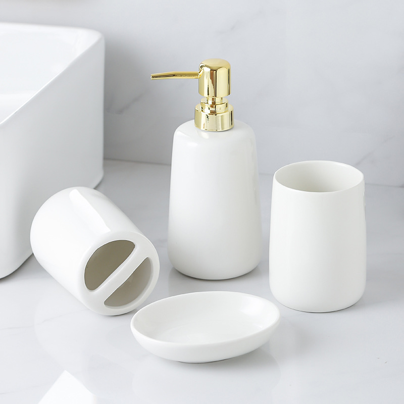 Kit de lavado de lujo ligero de alta calidad botella de embalaje de baño blanco puro simple botella de emulsión de baño cerámica de cuatro piezas set