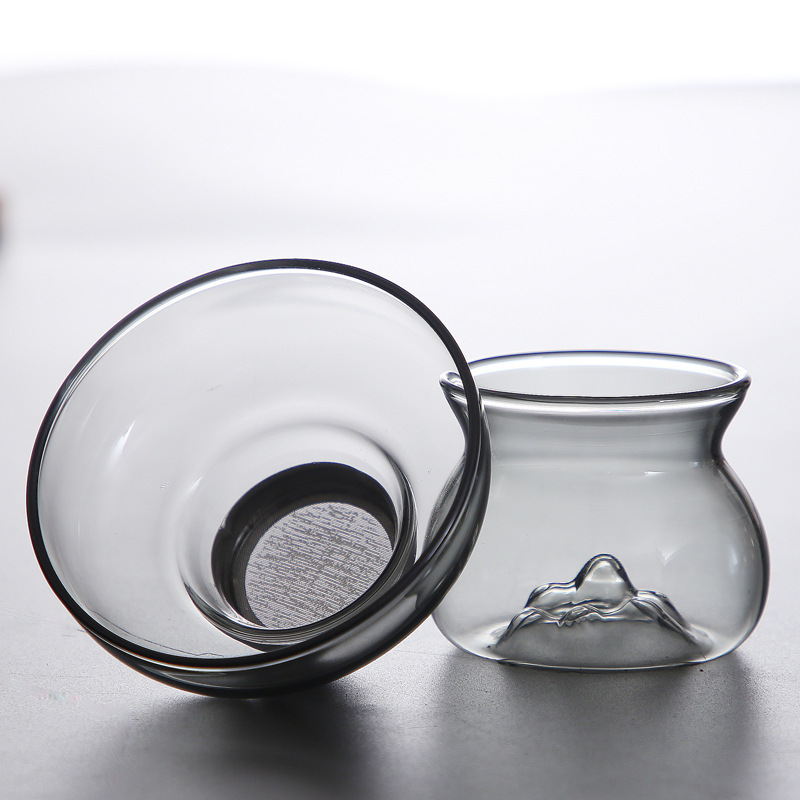 Fábrica al por mayor vidrio de borosilicato colador de té hogar Kung Fu juego de té accesorios creativo Guanshan colador de té colador de acero inoxidable