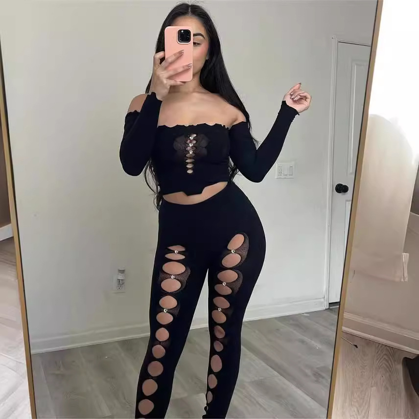 Yue mariposa Europa y los Estados Unidos nuevo amor hebilla un cuello de manga abierta blusa agujero pantalón sexy set YDT038