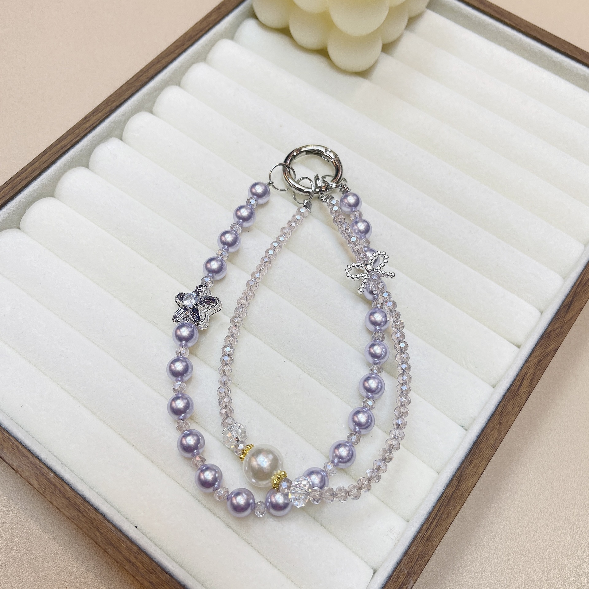 Cordón de teléfono móvil de doble cadena de cristal de moda cordón de muñeca con cuentas de alta gama colgante de estrella llavero de perlas cabello de una pieza