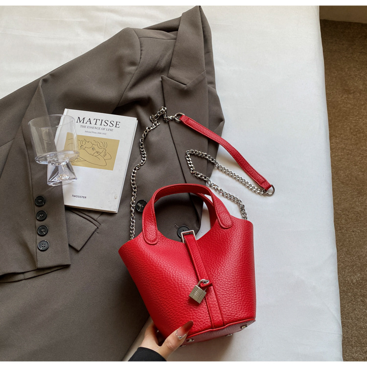 Bolso de madre de cubo de ocio simple para mujer 2025 versión coreana del nuevo bolso de mensajero exquisito de textura de moda ins