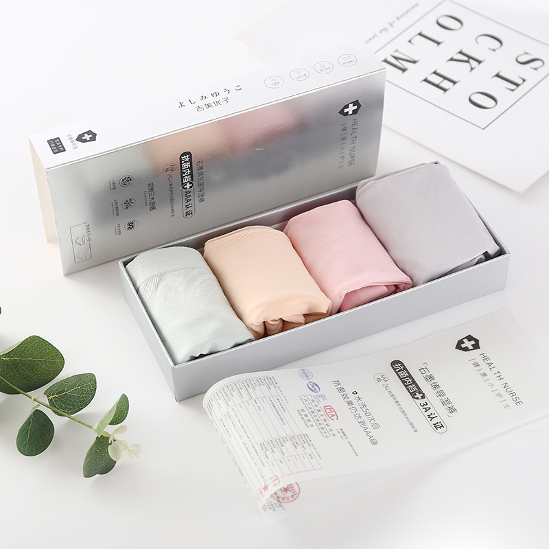 Caja de plata en caja de 4 piezas grafeno ropa interior húmeda bloque de algodón sin costuras para mujer amoníaco desnudo Levantamiento de cadera ropa interior de triángulo para mujer