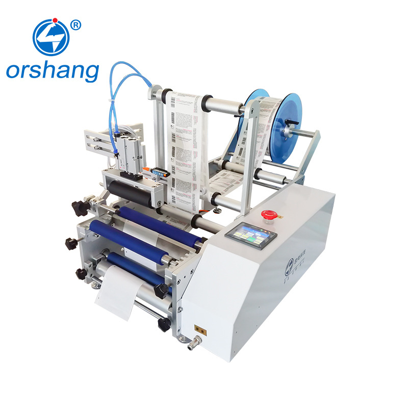 Semi-automatic fruit juice round bottle labeling machine
