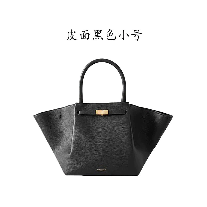 Handheld capacious purse, shoulder bag